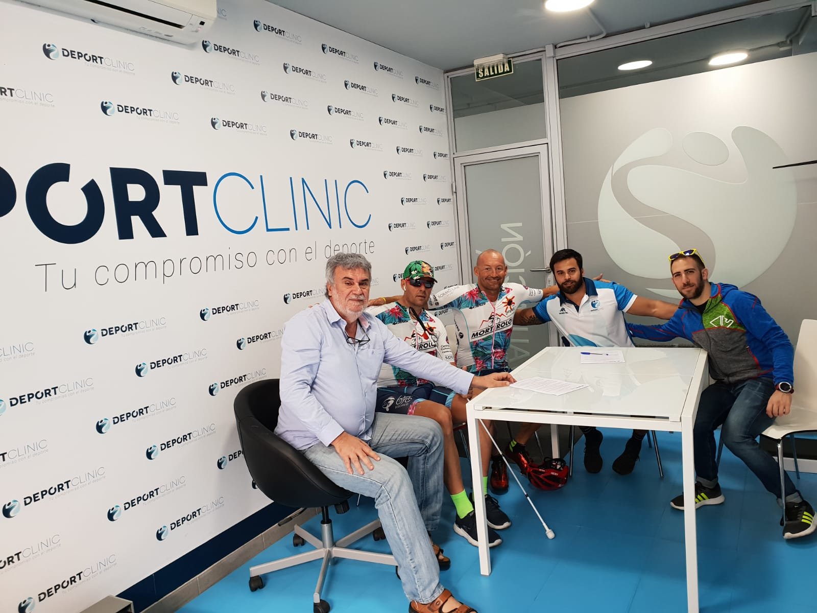Firma del convenio con Sportclinic